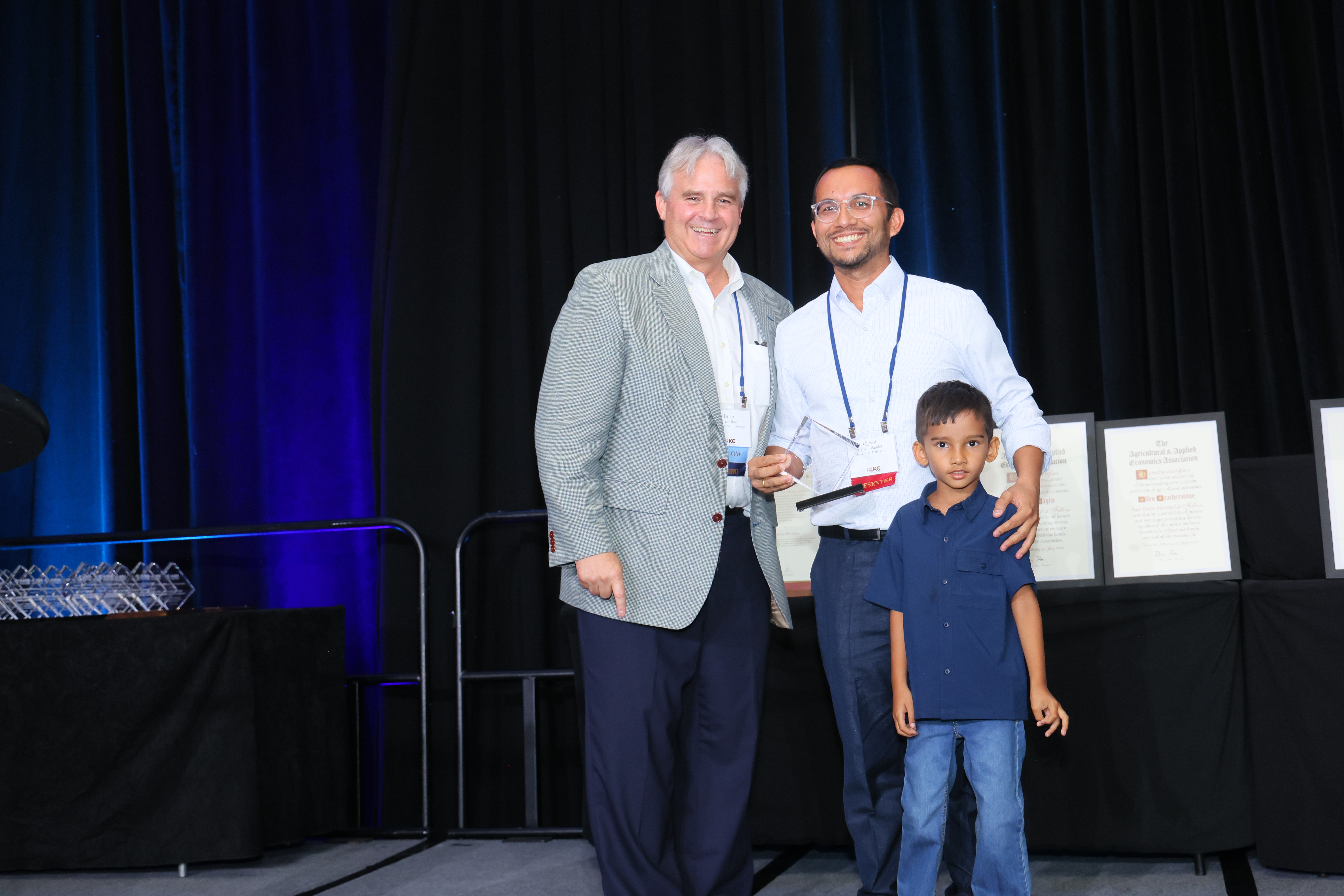 Ujjwol Paudel accepting the 2026 AEPP Outstanding Article Award